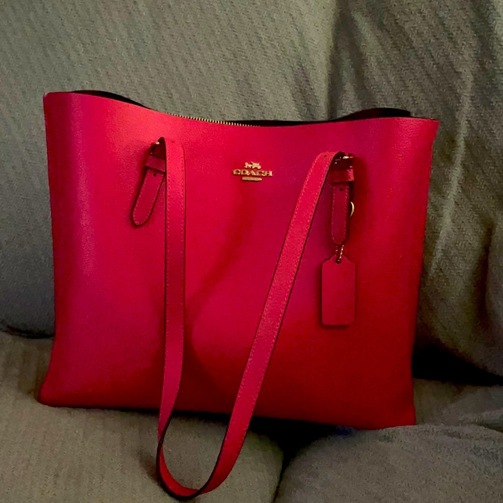 Coach Mollie Tote in electric pink.
